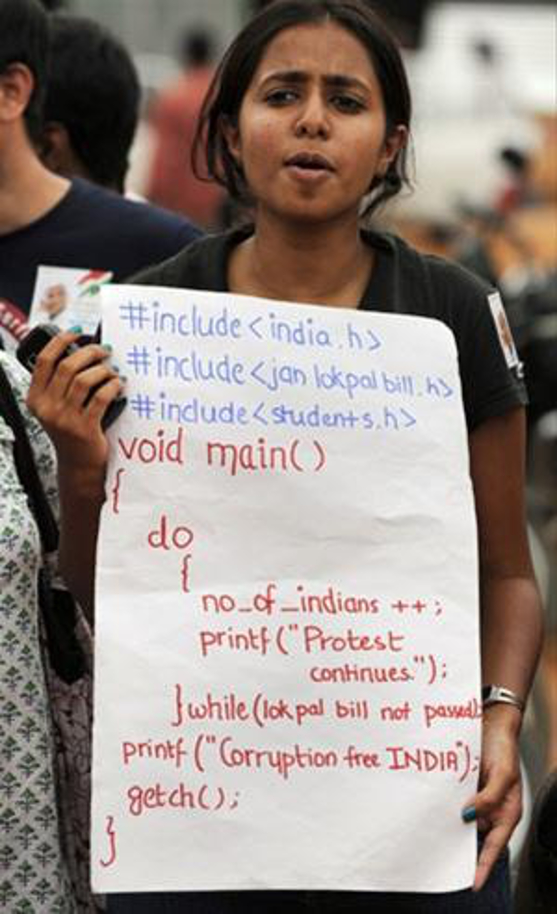 protester holding code sign